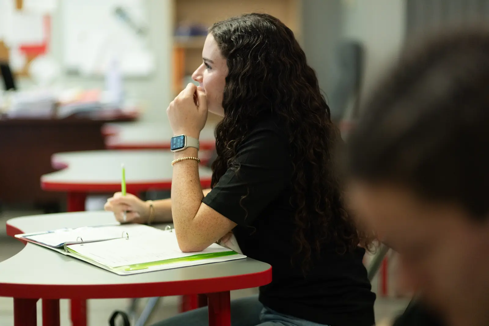 TCS campus and students engaged in learning