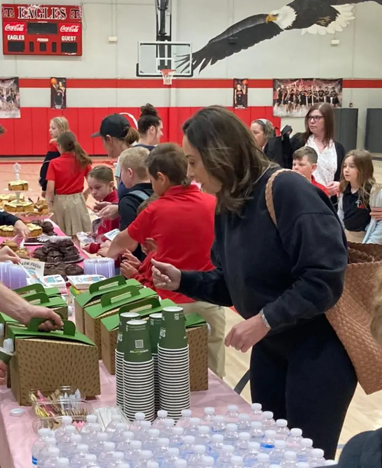 Mothers and children enjoying muffins together